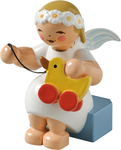Marguerite Angel sitting with Toy Duck