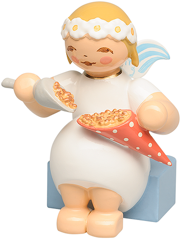 Marguerite Angel sitting with Roasted Almonds