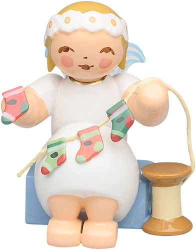 Marguerite Angel Sitting with Advent Calendar