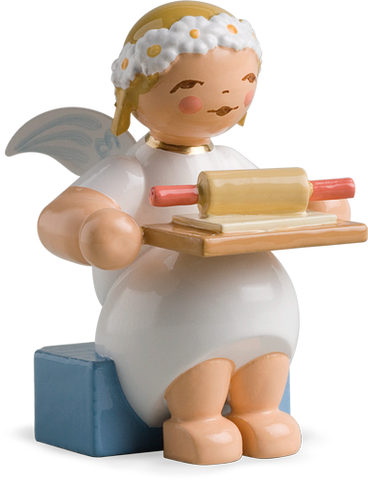 Marguerite Angel sitting with Rolling Pin and Cookie Dough