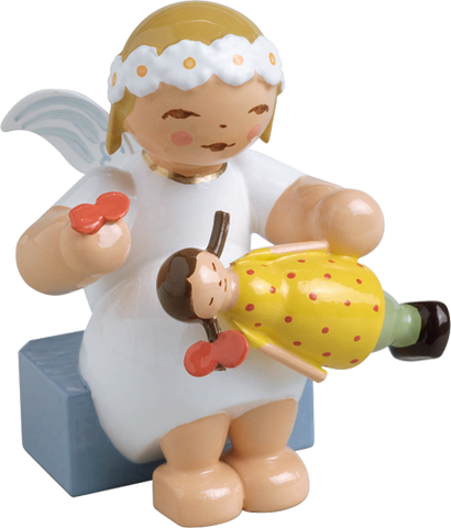Wendt and Kuhn Marguerite Angel with doll, sitting