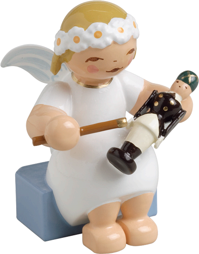 Wendt and Kuhn Marguerite Angel, seated, with Nutcracker