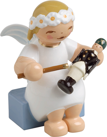 Wendt and Kuhn Marguerite Angel, seated, with Nutcracker