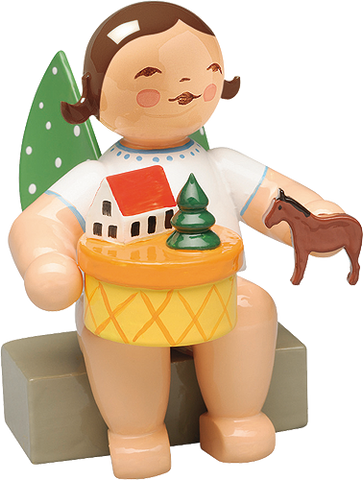 Wendt and Kuhn Angel in Toy Village, sitting
